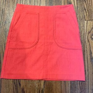 Salmon colored mini skirt